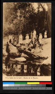 Missionary sisters standing on a rocky riverbank, Congo, ca.1920-1940