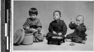 Three children eating, Japan, ca. 1920-1940