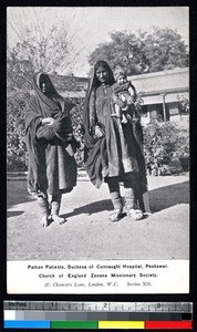 Women carrying children in front of hospital, Peshawar, Pakistan, ca.1900-1920