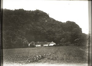 Buddhist monastery by a Jura cliff near Pyanglai (Honyen). The temple is built on the mountain, the altar stands in a stalactite grotto with a cave leading away from it