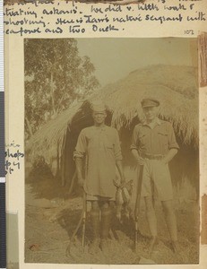 Two hunters with game birds, Nyanza province, Kenya, 1918