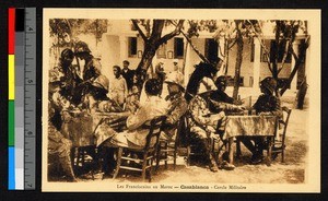 Military men seated at outdoor tables, Casablanca, Morocco, ca.1920-1940