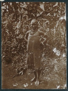 Woman in front of banana plantation, Tanzania, ca.1900-1914