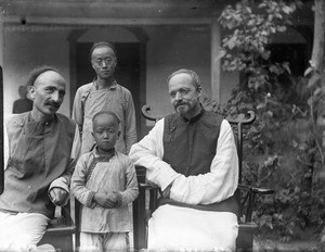 Portrait of Fr. Anthony Cotta, MM, and Fr. Vincent Lebbe with Chinese man and boy, China, ca. 1906-1919