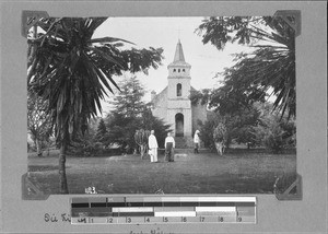 Missionaries Häfner and Stolz in front of the church, Rutenganio, Tanzania, ca. 1898-1909