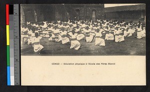 Young students doing gymnastics outdoors, Congo, ca.1920-1940