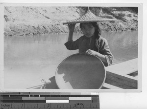 A fellow passanger on a ferry at Gaozhou, China, 1937