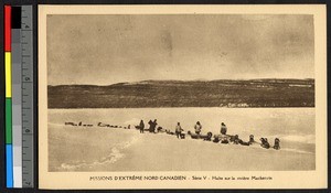 People guiding dog sleds across a snowy plain, Canada, ca.1920-1940