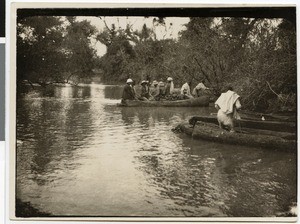 Crossing the river Gibe in a canoe