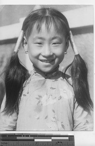 A girl with pigtails at Fushun, China, 1937