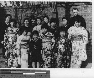 Maryknoll priest and Sister with Catholics at Fushun, China, 1940