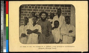 Missionary father with helpers, Congo, ca.1920-1940