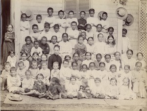 At a pre-school, Miss Marconnet with her pupils, Moorea