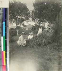 Three women missionaries in the garden, Faravohitra, Antsirabe, Madagascar