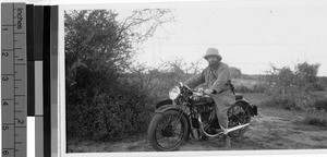 Father Junkers on a motorcycle, Africa, April 1947