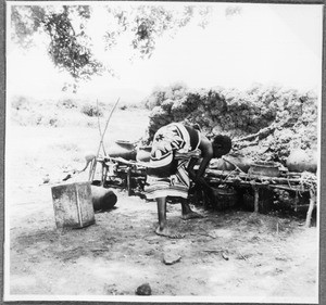 Woman producing salt, Pare, Tanzania, ca.1927-1938