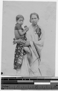 Woman carrying child, India, ca. 1900-1920