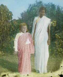 Indian lady with European girl, India, ca. 1930