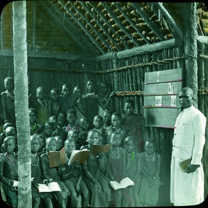 African school children with teacher, Tanzania, 1900-1910