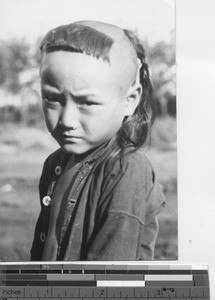 A Manchu hair style at Fushun, China, 1939