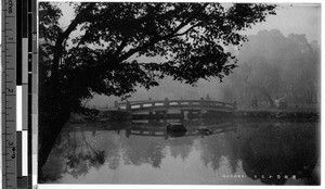 Walking bridge over water, Japan, ca. 1920-1940