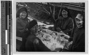 Maryknoll Sisters eating dinner, Punahou, Honolulu, Hawaii, ca. 1950