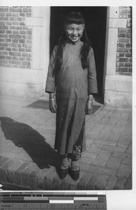 A young girl with bound feet at Fushun, China, 1937