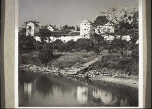 A so-called four-tower house, and in the foreground the fish pond (which no good chinese house can do without)