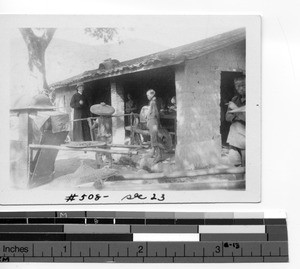 Bishop James E. Walsh, MM at a tea house enroute to Luoding, China, 1928