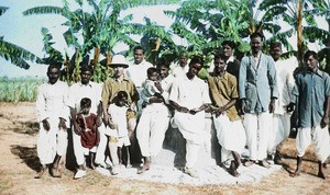 Missionary with Indian men and boys, India, ca. 1930