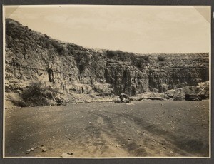 Camp next to rocks, Tanzania, ca.1926-1940