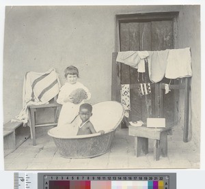 Two young children bathing, Blantyre, Malawi, ca.1910