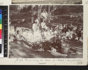 Group portrait of children with female missionaries on picnic, Coimbatore, Tamil Nadu, India, ca. 1910