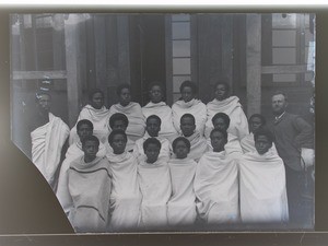 A missionary together with boy students, Ambato(?), Madagascar, ca.1900