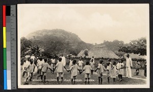 Children playing a game at school, Nigeria, ca.1920-1940