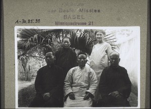 Behind: the lady teacher Tsok Lan Kwui and Miss Hoseit, headmistress of the girls' school in Longheu. In front Rev. Wong and the teachers Tschhin and Tschong from Longheu, 1930