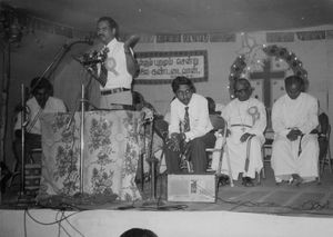 South India. From a convention of the Arcot Lutheran Church. D. G. S. Dhirakaran speaking to th