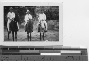 Maryknoll priests on horseback at Hong Kong, China, 1937