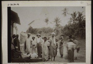 In front of the Mission Trading Company store in Bonaku