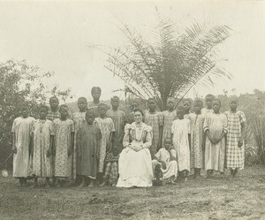 Mrs Vernier and pupils of the mission school, in Gabon