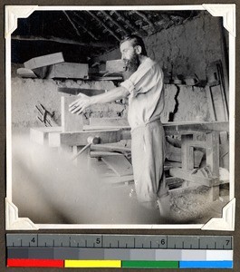 Father Sirlinger doing carpentry work, Shendam, Nigeria, 1923