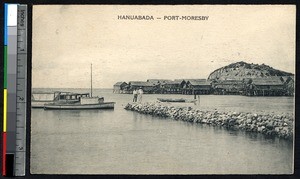 Men standing on a stone jetty with a view of the bay, Port Moresby, Papua New Guinea, ca.1900-1930