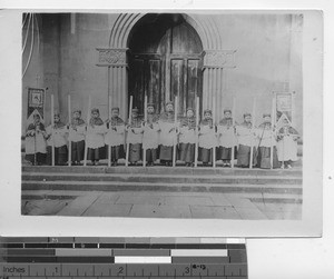 Altar boys on church steps in China