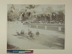 Arena with men and an ox bullfighting, Andohalo Park, Antananarivo, Madagascar, 1902