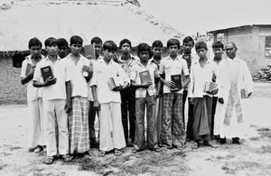 Bangladesh Lutheran Church/BLC. Rev. Maidas Marndi, BNELC (right), with a group of confirmant c