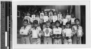 St. Anthony's School fourth grade boys with Mass cards, Kalihi, Honolulu, Hawaii, 1947