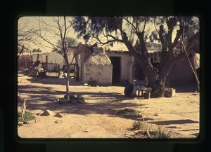 house and outbuildings