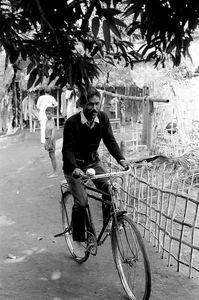 Bangladesh Lutheran Church/BLC, Bhandarugram 1989. Evangelist biking on the way to work