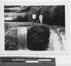 Two Christian men at a waterfall near Lam Nian Ts'ia, China, 1935