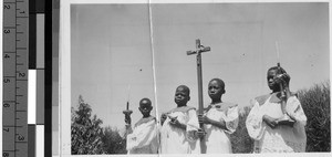 Four altar boys standing outside, Kowak, Tanzania, Africa, April 9, 1947